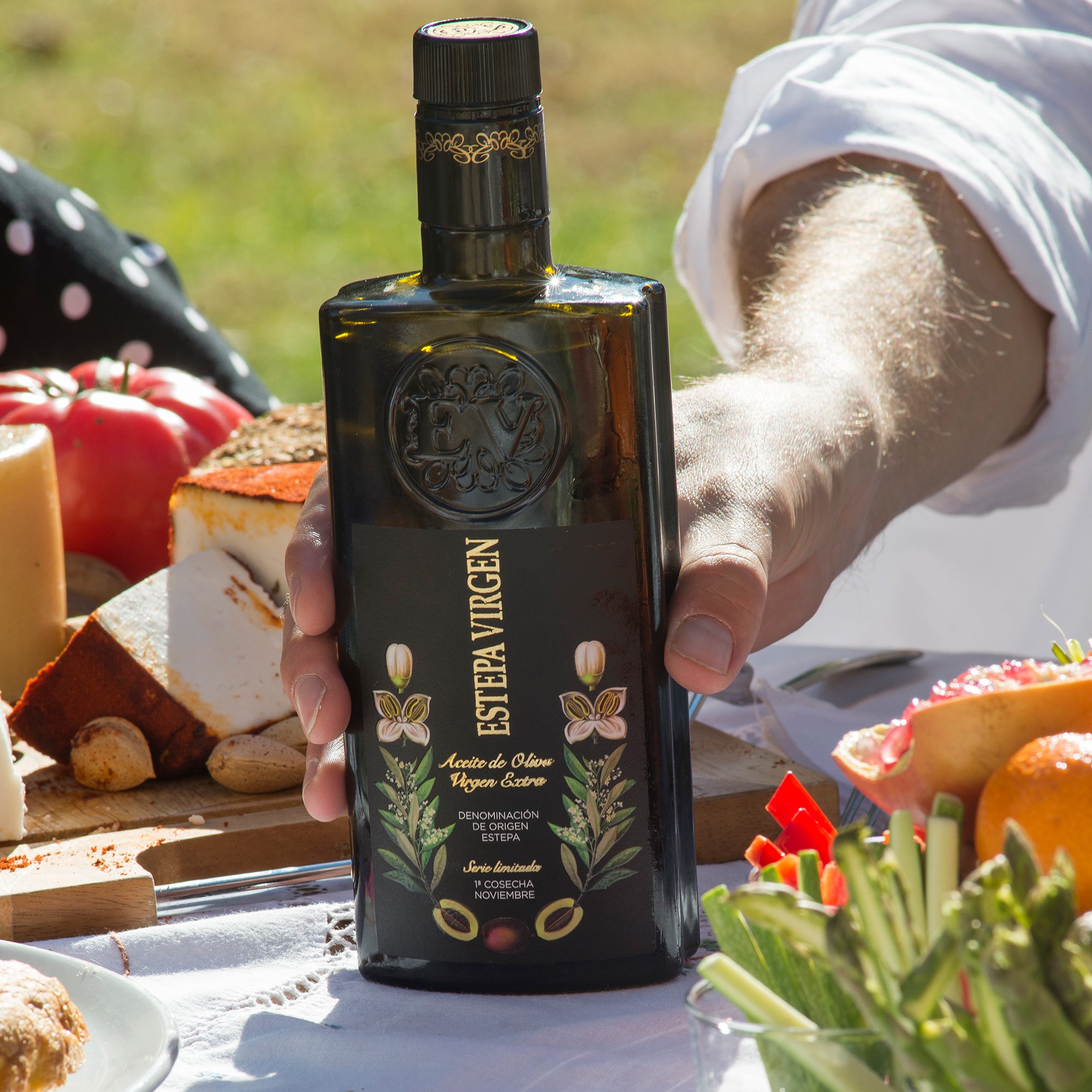 An Estepa Virgen extra virgin olive oil bottle placed on a table, highlighting Spanish EVOO.