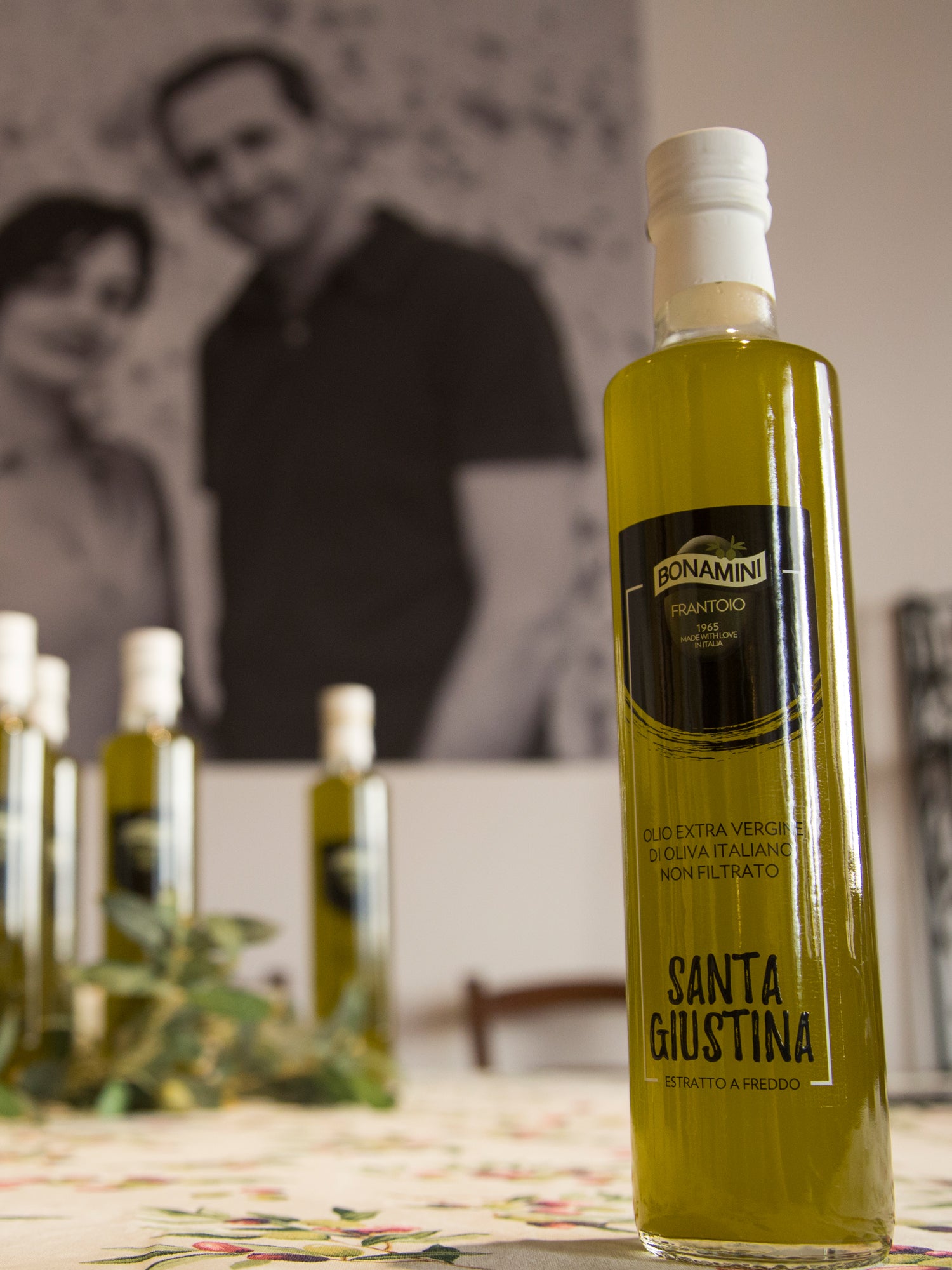 Bottle of Bonamini olive oil on a white background