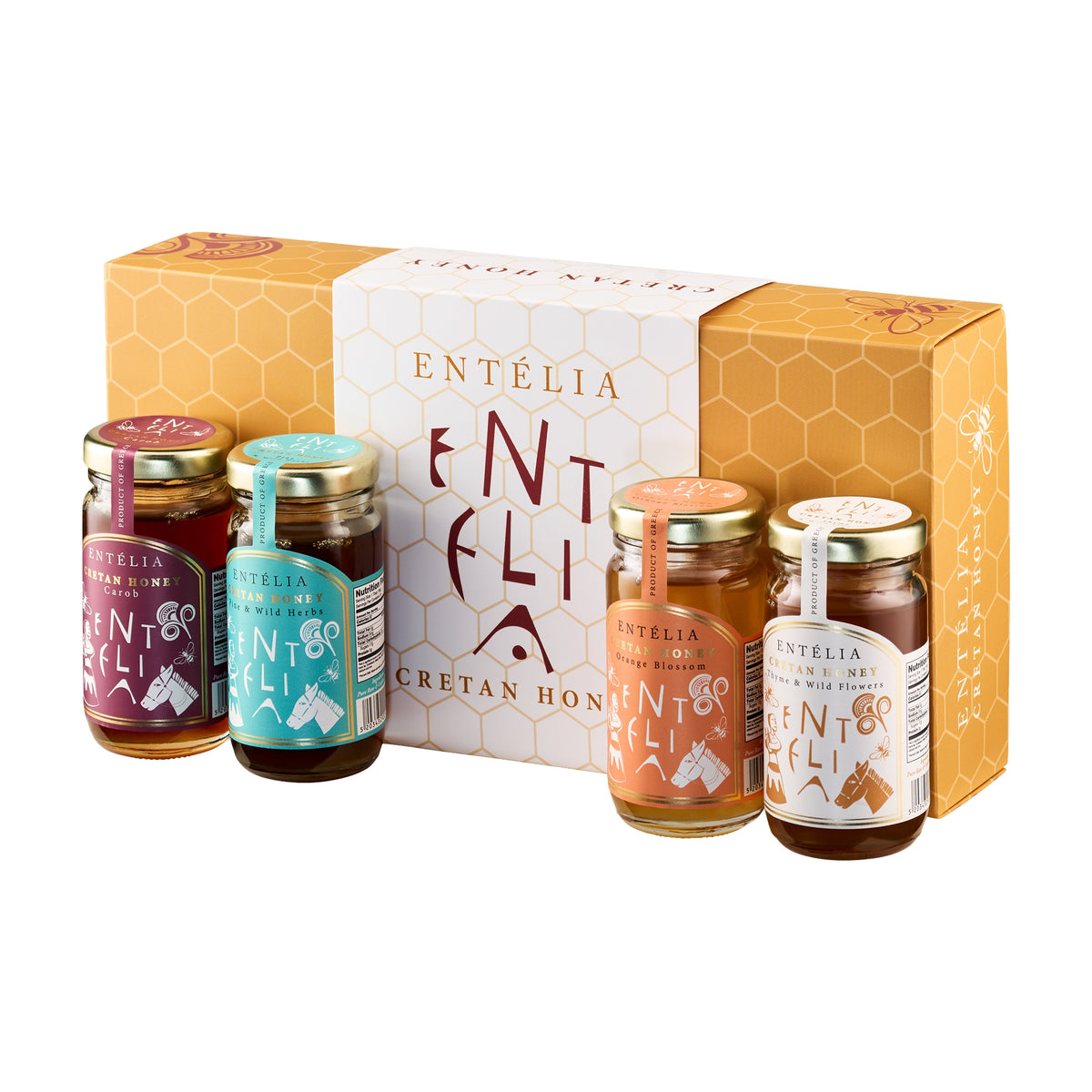 Four 100 g Entelia Cretan honeys; Carob, Pine & Wild Herbs, Orange Blossom, and Thyme & Wild Flowers, with gift box.