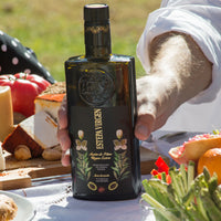 An Estepa Virgen extra virgin olive oil bottle placed on a table, highlighting Spanish EVOO.