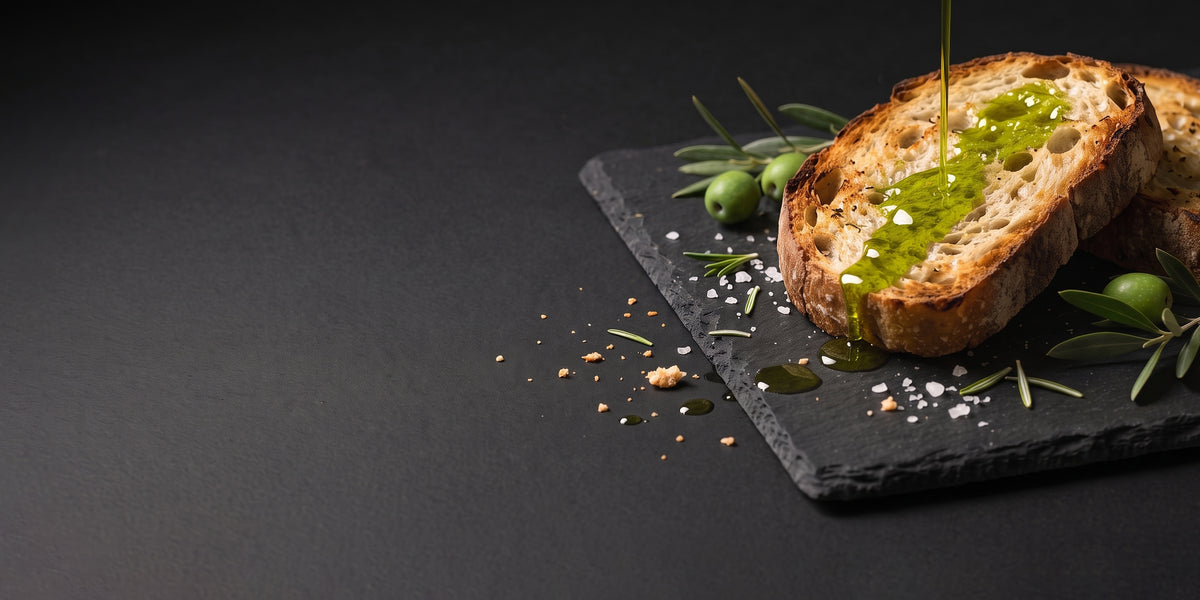Novello olive oil drizzled over freshly baked bread.